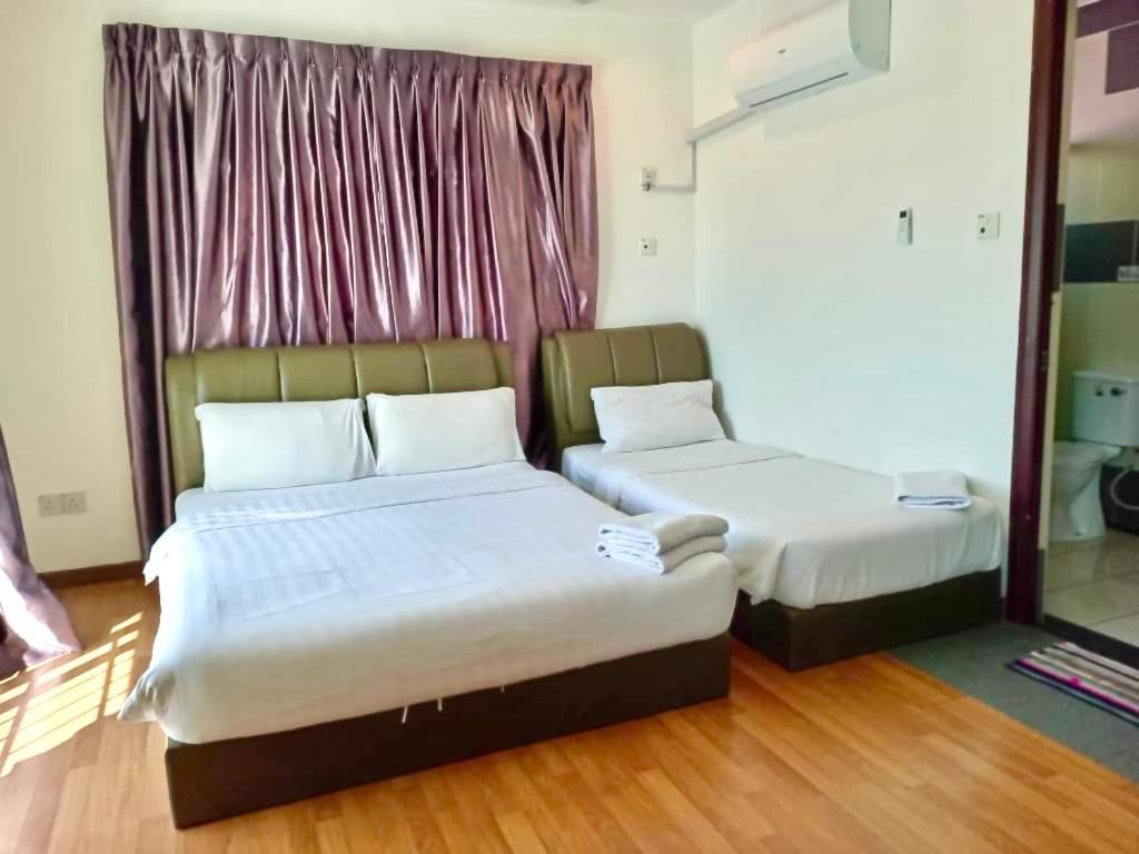 Borneo Inn Kota Kinabalu Exterior foto